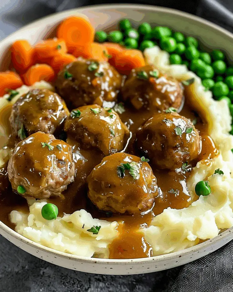 Meatballs with Mashed Potatoes, Gravy, Carrots, and Peas