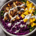 Jerk Chicken with Mango Slaw and Honey Lime Cream