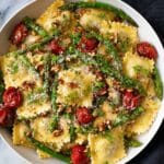 Fresh Ravioli with Tomato, Asparagus, and Herb Garlic Sauce Recipe