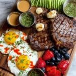 Steak and Eggs Board with Fruit, Avocado, Cowboy Butter, and Chimichurri Recipe