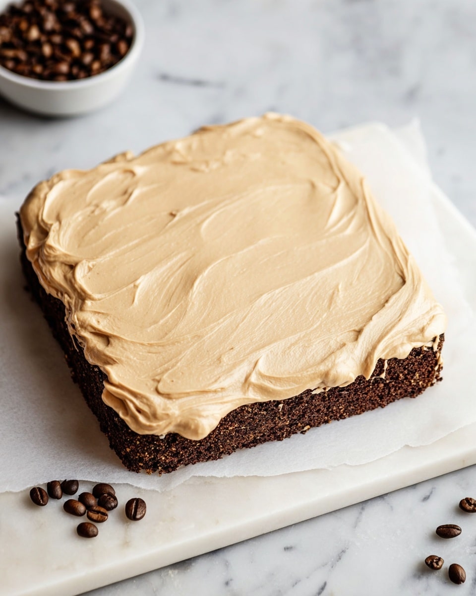 A close-up image of a single slice of pie featuring two main layers: the bottom layer is a dark, rich chocolate filling with a smooth, slightly shiny texture, studded with chocolate chunks; the top layer is a golden-brown cookie-like crust that is cracked and uneven, revealing melted chocolate inside. The crust edges are thick and crumbly with a light tan color. The slice sits on parchment paper on a white marbled surface, with scattered chocolate chips around it. In the blurred background, a white bowl filled with more chocolate chips is visible. Photo taken with an iphone --ar 4:5 --v 7